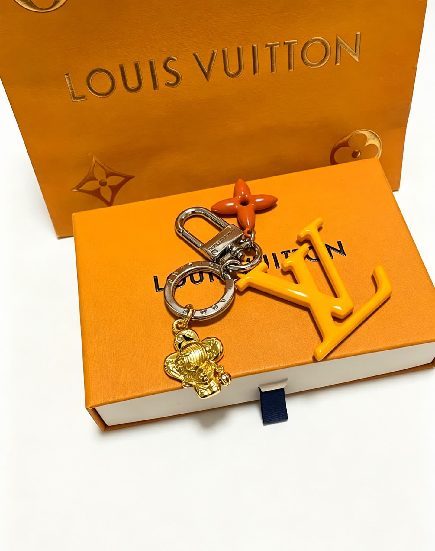 Louis Vuitton Keychain with LV Logo and Monogram Motif